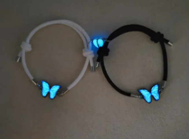 Pair of Blue Luminous Smart Butterfly Necklaces by Phora'store with glowing blue butterfly charms