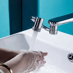 1080° rotatable faucet extender by Phora'store, chrome finish, shown attached to faucet with hands washing