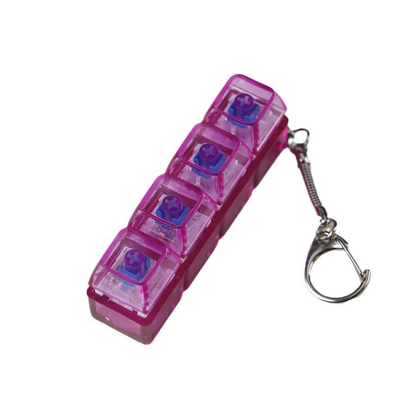 Transparent pink PC shaft tester with light, four clear compartments, attached keychain